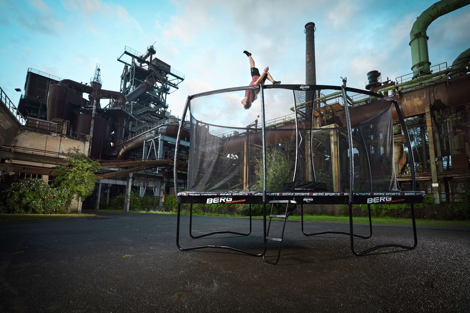 Athlete training on BERG AeroWall rebound wall attached to a FlatGround trampoline